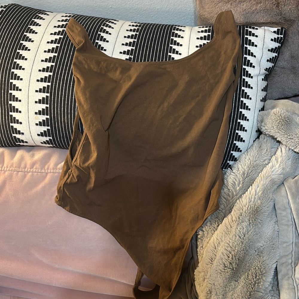 Brown body suit